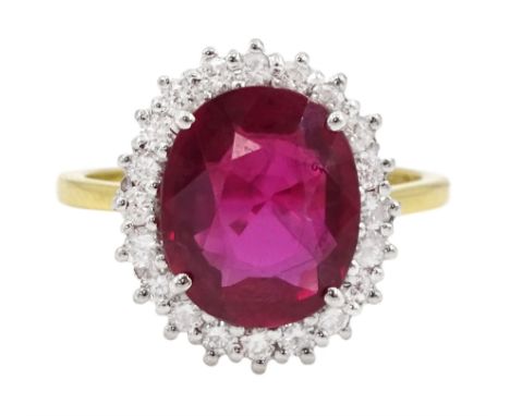 18ct gold oval cut Thai ruby and round brilliant cut diamond cluster ring, hallmarked, ruby approx 4.35 caratCondition Report