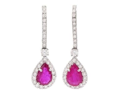 Pair of 18ct white gold, pear cut ruby and round brilliant cut diamond pendant stud earrings, stamped 750, total ruby weight 