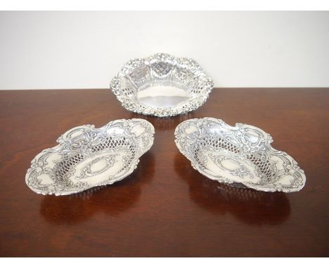 A pair of William Hutton & Sons Ltd. silver pierced dishes, Birmingham 1903 and William Aitken pierced dish, Birmingham 1903,