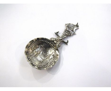 A white metal caddy spoon stamped 925, possibly Flemish 
