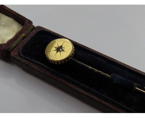 A Victorian stick pin set with single diamond 