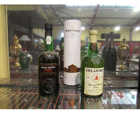 Three bottles of Port, Delaforce white port, Grahams 2009 late bottled vintage port and Cockburns Special reserve port (3)