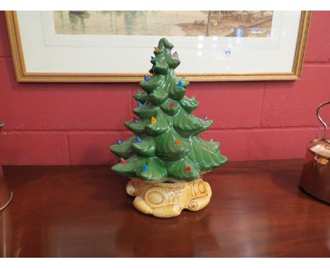 A ceramic Christmas tree table lamp