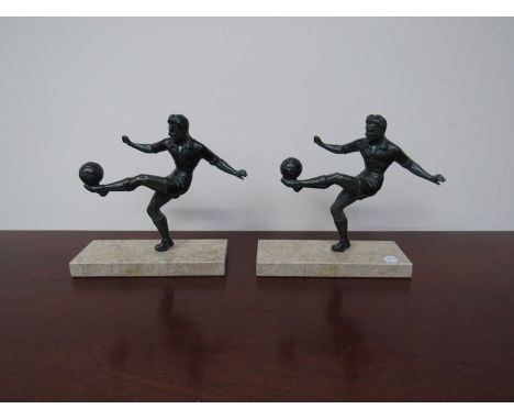 A pair of cast Art Deco style bookends in the form of footballers on stone base 