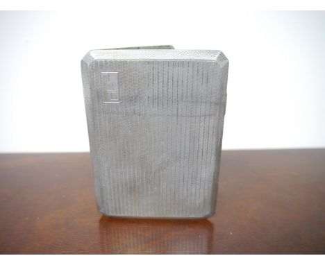 A silver cigarette box with engine turned detail, 12cm long 