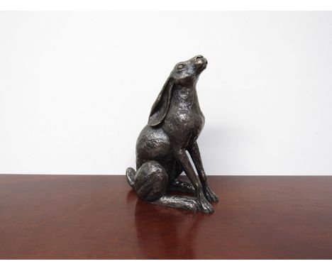 A large resin bronze hare moongazing 27cm tall