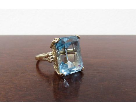 A large blue Topaz ring set in 9ct gold, stone measures 10mm by 12mm ring size K