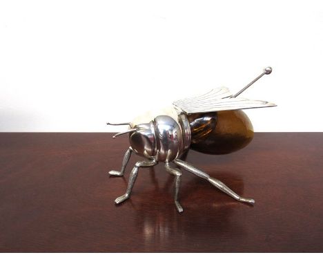 A silver plated honey pot in the form of a bee together with a silver plated duck wine decanter (2)