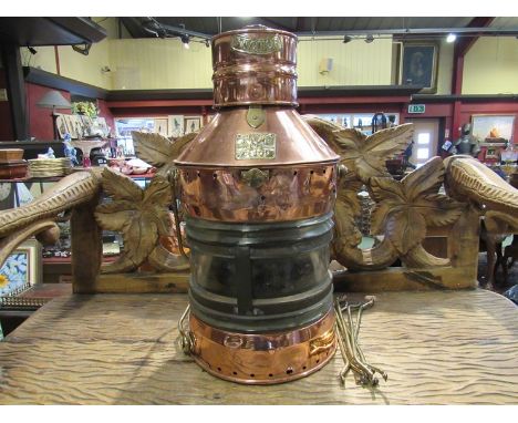 A "Seahorse" copper and brass ships lamp