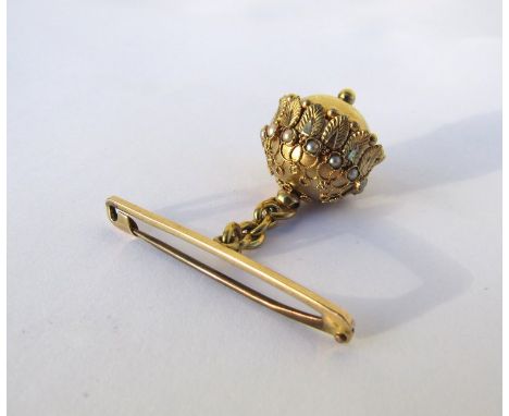 A pearl stick pin, a gold filigree and pearl hanging brooch 