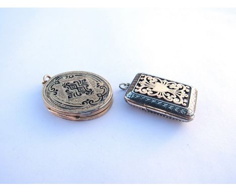 Two Victorian yellow and rose gold on silver lockets, one an oval memoriam locket with black enamel decoration, foliate engra