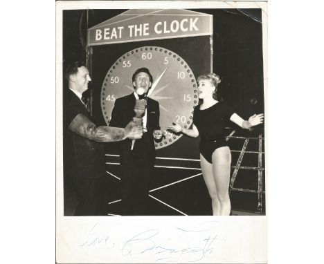 Bruce Forsyth signed vintage 10x8 black and white photograph pictured during the 15 minute game show, Beat The Clock. Sir Bru