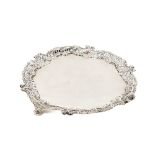 A heavy silver Card Tray, with pierced and cast border, London 1932, AP FP AR, on three winged