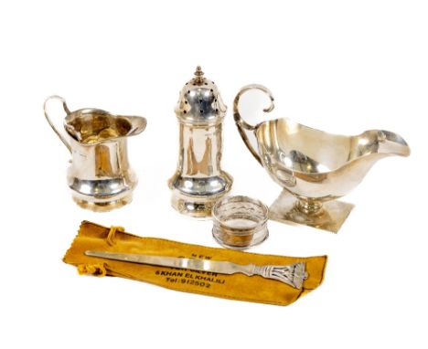 A heavy modern silver Georgian style Sauceboat, with scroll handle on a square base; a silver Georgian style Cream Jug, a sil