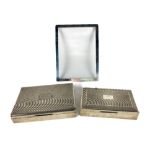 A rectangular machine turned silver Cigarette Box, Birmingham, 1955, 17cms (6 1/2"); and a smaller