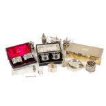 Silverware: A collection of varied silver Trinkets, including two silver cased pairs of Napkin