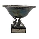 An attractive Sterling silver Trophy Bowl, with circular bead edge on a tri-dolphin support on