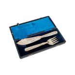 An attractive cased set of Chinese Export engraved and decorated silver Fish Servers, each with