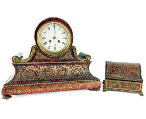 A 19th Century boulle Mantle Clock, the circular enamel dial with Roman numerals over a concave rectangular body profusely de