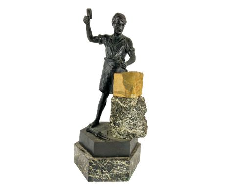 After Hans Keck, German (1875-1941)  A fine quality bronze Figure of a stone mason at work, with hammer and chisel in hand st