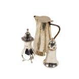 A heavy reeded and baluster shaped Irish silver Castor Sugar Shaker, by Royal Irish Dublin, with