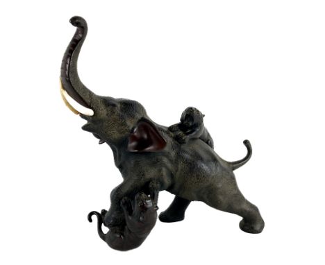 A Japanese bronze Model of an Elephant, being hunted by tigers, inset with tusks, approx. 32cms high x 33cms long (12 1/2" x 