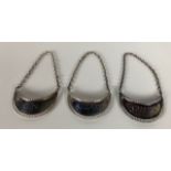 A set of three silver Drinks Labels, "Sherry," "Brandy" and "Gin," hallmarked H.U. (Hampton