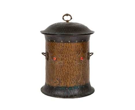 An attractive fine quality Arts and Crafts Scottish School Fuel Bin, the domed lift top with ornate handle over a cylindrical