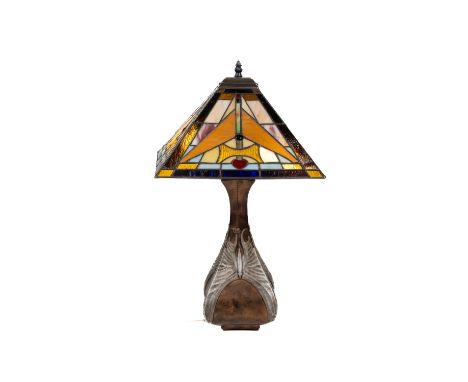 A Tiffany style bronzed and stained glass Shade, the square flared shade with numerous coloured glass arrangements on a bottl