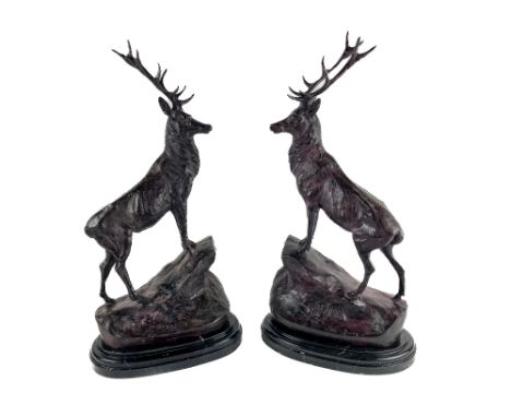 After Jules Moigniez French (1825-1894)  "Pair of Stags," bronze, each in opposing position, standing on rocky naturalistic b