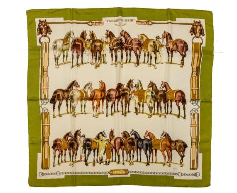 A Hermes Ladies silk Scarf, 'L'Arriere-Main,' depicting horses and groomsmen, with Hermes label. (1) 