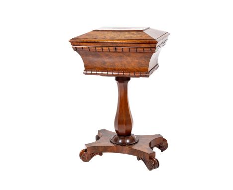 A fine quality William IV Irish mahogany Tea Caddy, on stand, the&nbsp;sarcophagus top with slanted panels and moulded edges,