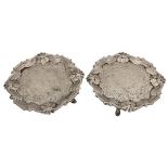 A pair of George II silver Card Trays or small Salvers, by J. McFarlane, London 1752, each chased