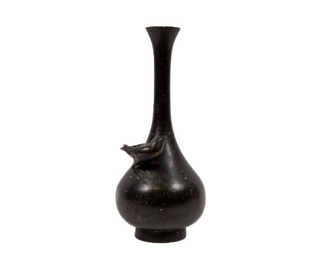 An attractive and heavy Japanese (Meiji) period bronze tubular Vase, with trumpet neck, bird surmounted, resting in relief on