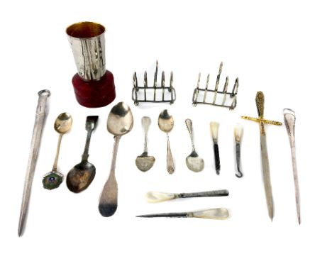 Two silver plated Skewers, a Toledo sword form Letter Opener, four silver Spoons, four mother-o-pearl handled Manicure Items,