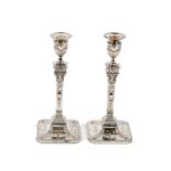 A good pair of late 19th Century Adams style silver Candlesticks, Sheffield 1898, each embossed with