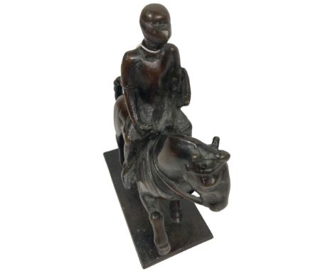 A heavy bronze Group, modelled as a Medieval Soldier holding a shield on horseback, 33cms (13''). (1) 