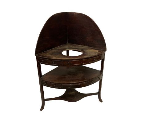 An early 19th Century Irish mahogany Washstand, by Williams &amp; Gibton stamped on the centre drawer and with the number 105