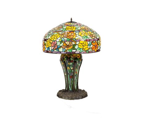 A very attractive large Tiffany style bronzed and stained glass Table Lamp, with colourful mushroom shade on a baluster vase 