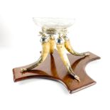 An unusual large Table Centre, supported by cornucopia style horns with plated dolphin head