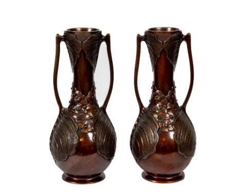 An exceptional pair of Japanese Art Nouveau Meiji bronze Vases&nbsp;of bottle form and lily handles with flowers in relief, 3