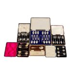 A cased set of 12 Sheffield silver Teaspoons, c. 1921, and a matching Sugar Tongs, a cased set of