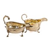 A Georgian style silver Sauceboat, by Harman London 1930, together with another similar Birmingham