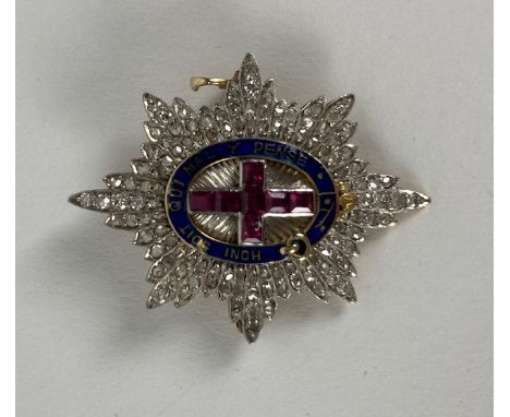 An important Order of the Garter Brooch, with 'Honi Soit Qui Mal Y Pense,' set in platinum and gold, with 112 cut diamond and