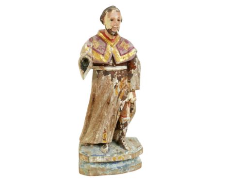 A 19th century Spanish carved pine religious sculpture, modelled as a Saint Roche, the patron saint of those suffering from p