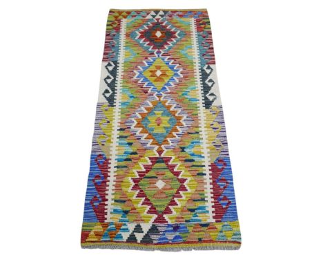 A Chobi Kilim runner hand knotted woolen rug, 152 by 65cm.