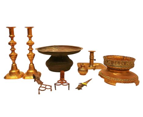 A south east Asian spitoon engraved with peacocks, an early brass urn stand, a small kris, three candle sticks and two snuffe