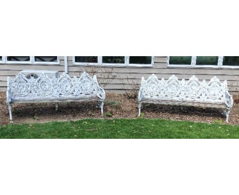 A rare pair of Macauley and Wade Foundry cast iron Four Seasons garden benches, circa 1870, each 180cm wide. Note: wooden sea