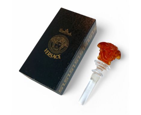 A Versace Rosenthal crystal glass bottle stopper with Medusa head,  13cm long. with original fitted box.