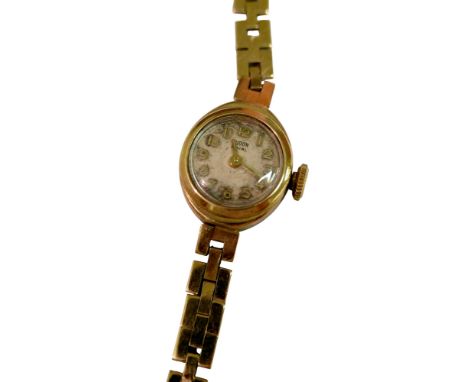 A lady's 9ct gold Tudor Royal cocktail watch, with ARabic dial, case and bracelet stamped 'Rolex', 12.5g gross.